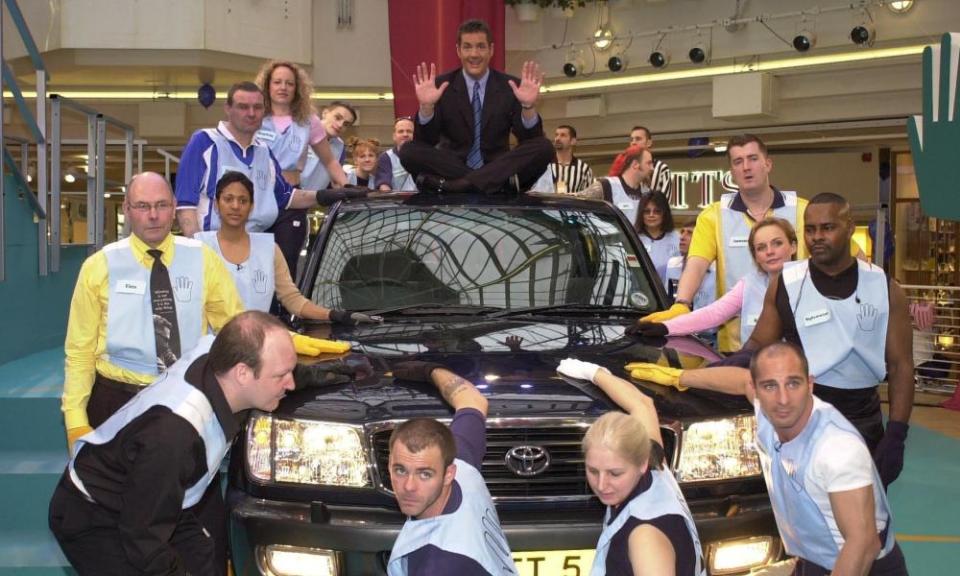 Game on … Dale Winton, centre, and the Touch the Truck gang at the Lakeside shopping centre, Essex, in March 2001.
