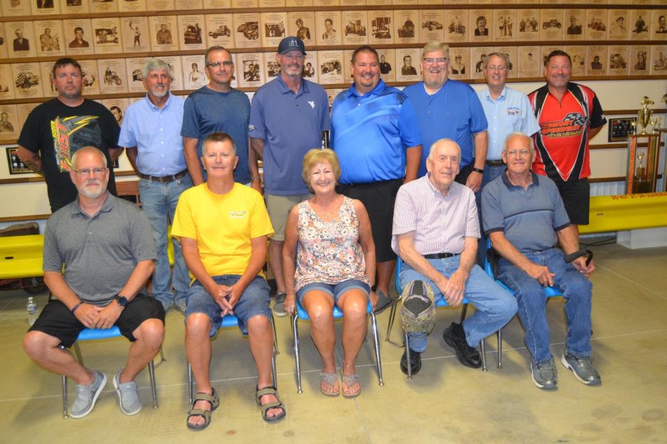 Fremont Speedway Hall of Fame inducted 10 individuals in 2022. Front row, John Raubenolt, representing his father, Bob Raubenolt, Monte and Vicki Collins, Al Harrison and Bob Hampshire. Back row, Hall of Fame trustee Rich Farmer, inductees Dan Roepke, Bryan Scott, Dale Blaney, and Adam and Willie Steinbrick, representing father Chuck Steinbrick, and Hall of Fame trustees Randy Mapus and Brian Liskai.