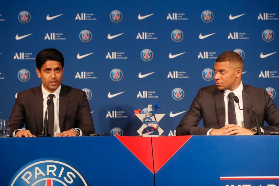 PSG striker Kylian Mbappe, right, and PSG president Nasser Al-Khelaifi (Michel Spingler/AP) (AP)