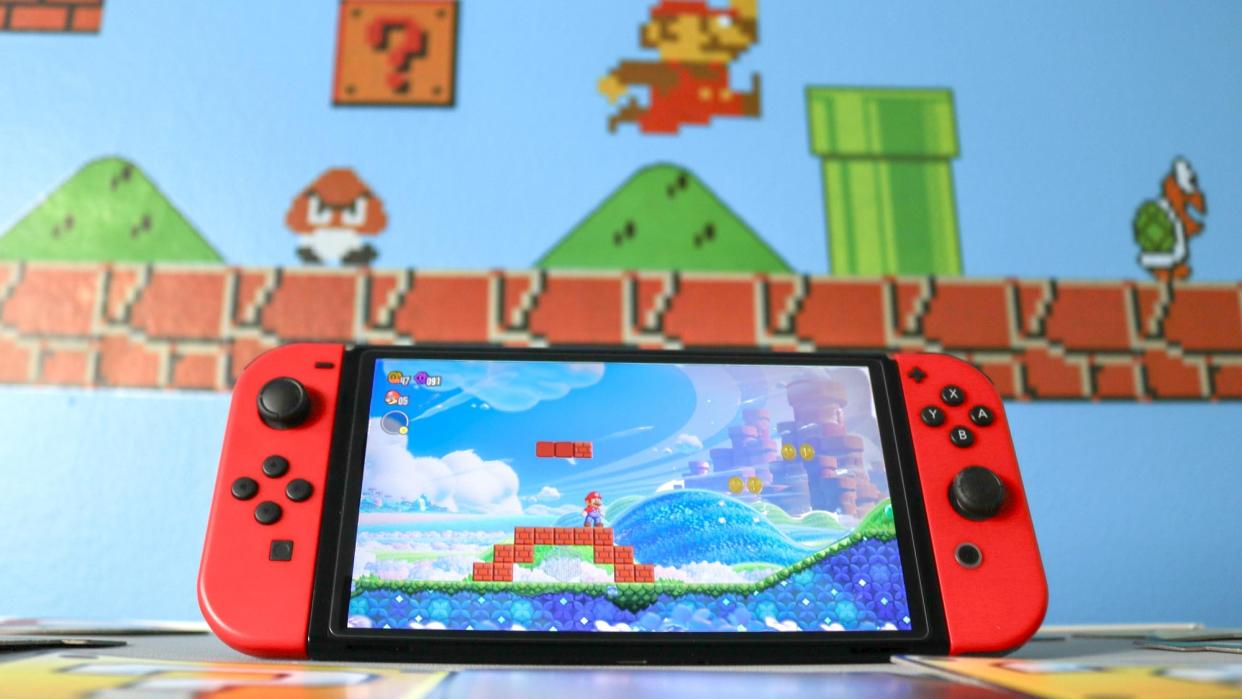  Super Mario Bros. Wonder on a Nintendo Switch with a Mario-themed wall in the background. 