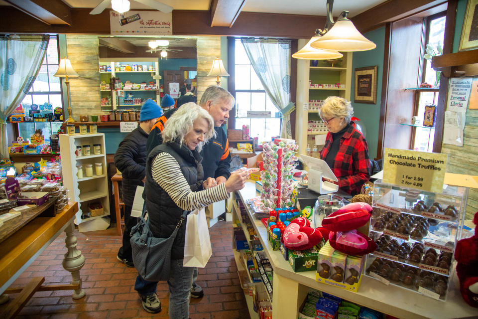 Chocolate lovers participate in the first Our Town Coshocton Chocolate Walk in February.