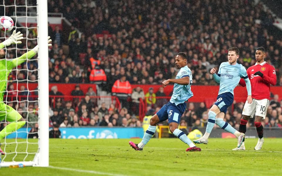 Manchester United's Marcus Rashford (right) scores their side's first goal of the game during the Premier League match at Old Trafford, Manchester. Picture date: Wednesday April 5, 2023. - Nick Potts/PA