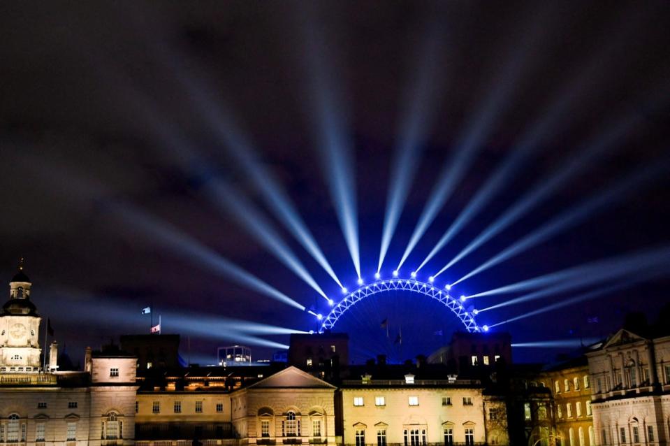 The London Eye was iluminated ahead of the New Year's Eve celebrations on Saturday night (REUTERS)