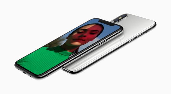 Two iPhone X devices, showing front and back.