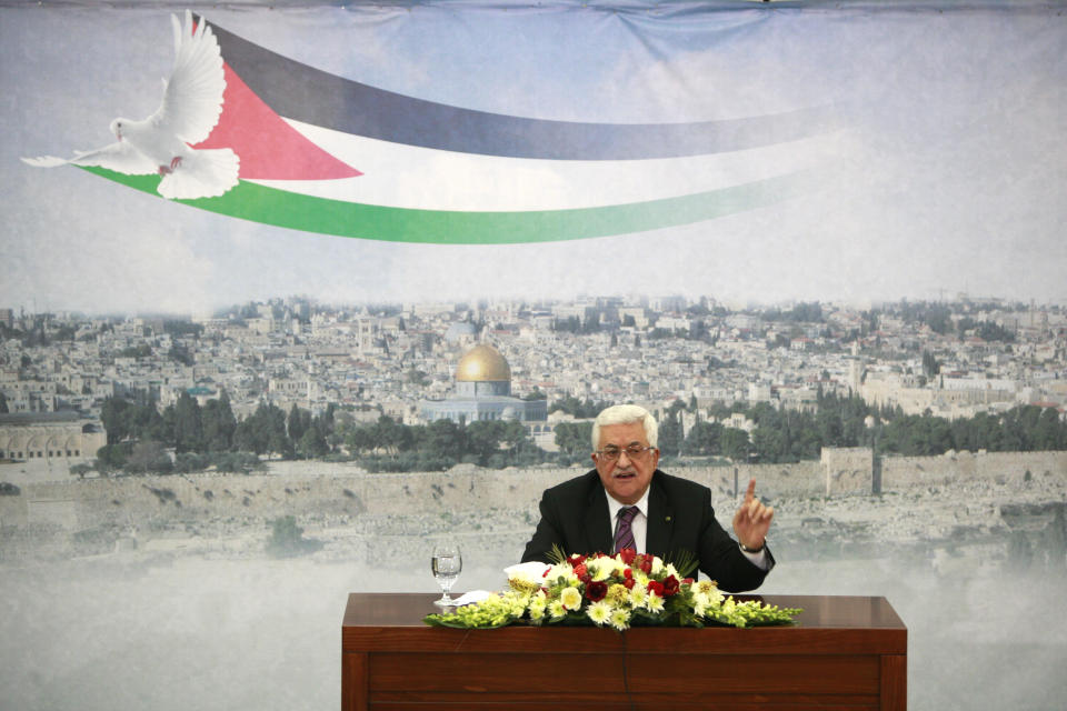Palestinian President Mahmoud Abbas speaks during a meeting at his compound in the West Bank city of Ramallah, Saturday, Jan. 11, 2014. (AP Photo/Majdi Mohammed)