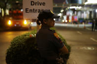 <p>Police outside a hotel at the Resorts World Manila complex, early Friday, June 2, 2017, in Manila, Philippines. (Photo: Aaron Favila/AP) </p>