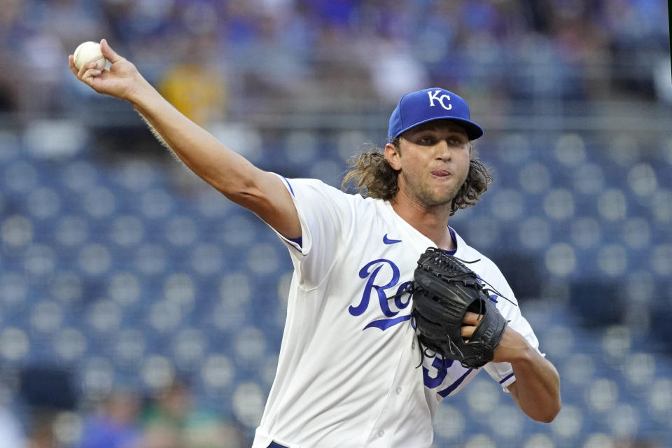 Kansas City Royals starting pitcher Jackson Kowar throws during the first inning of a baseball game against the Cleveland Indians Wednesday, Sept. 1, 2021, in Kansas City, Mo. (AP Photo/Charlie Riedel)