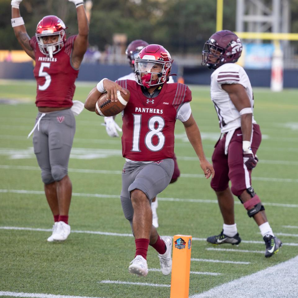 Virginia Union quarterback RJ Rosales (18) scores a touchdown in the second half of Sunday's Black College Football Hall of Fame Classic against Morehouse.