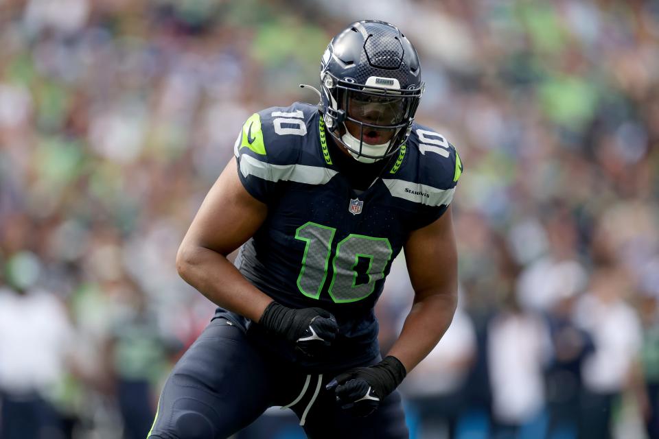 SEATTLE, WASHINGTON - SEPTEMBER 10: Uchenna Nwosu #10 of the Seattle Seahawks reacts after a save against the Los Angeles Rams at Lumen Field on September 10, 2023 in Seattle, Washington. (Photo by Steph Chambers/Getty Images)