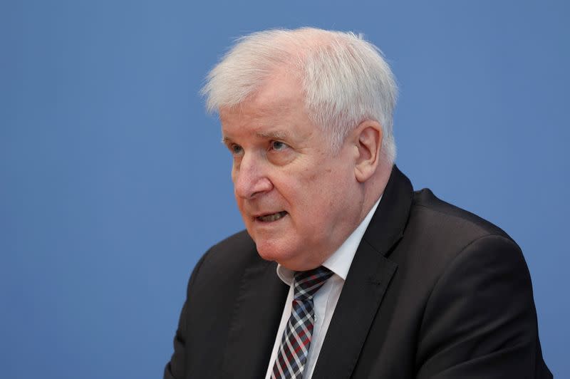 Germany's Interior Minister Seehofer attends news conference on migration, in Berlin