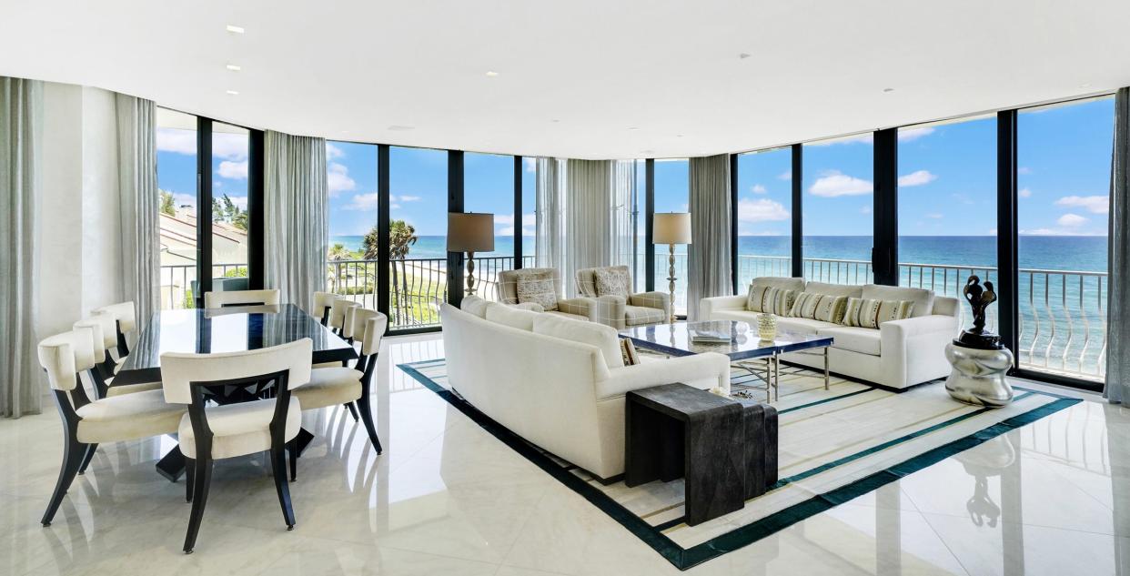 Priced furnished with a pool cabana at $13 million, the third-floor condominium at No. 301N at 2000 S. Ocean Blvd. has a living area with wide views of the Atlantic Ocean at the Sloan’s Curve development on the South End of Palm Beach.