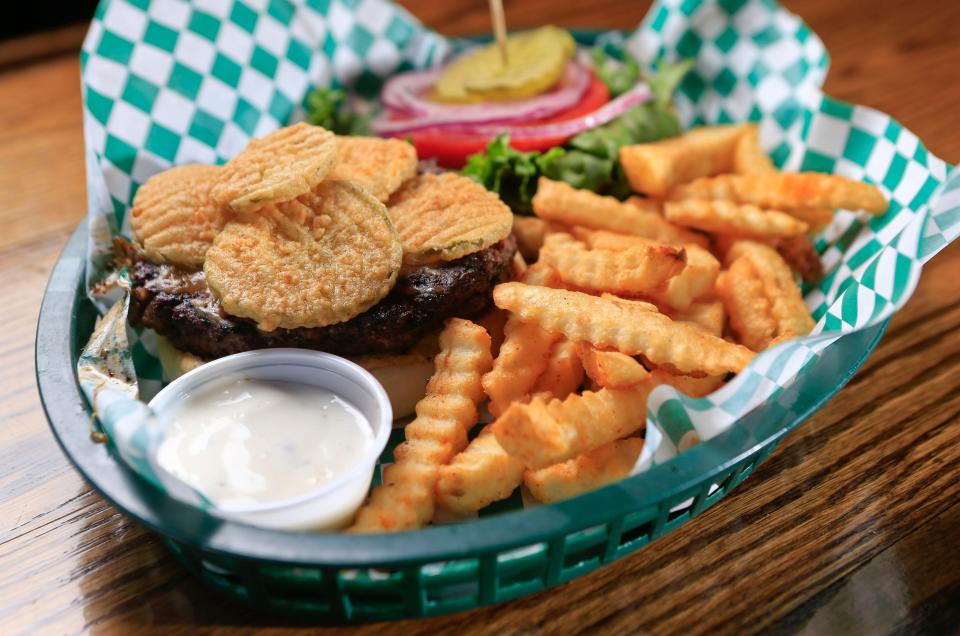 The DePaul Husky burger from Shenanigans features fried picked as a topping.