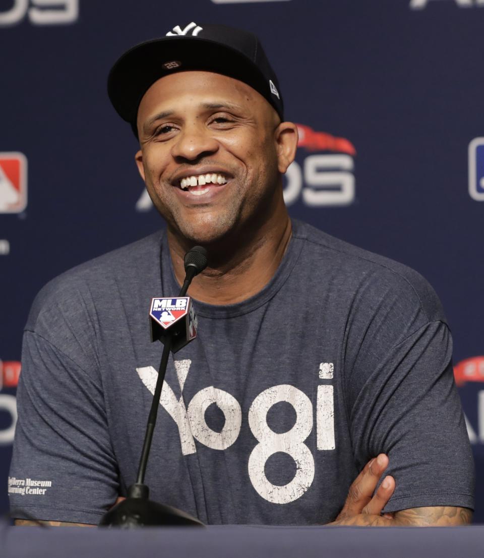 FILE - In this Oct. 8, 2018, file photo, New York Yankees starting pitcher CC Sabathia responds to a question during a news conference before Game 3 of baseball's American League Division Series, in New York. The New York Yankees gave pitcher CC Sabathia a $500,000 performance bonus, even though the 38-year-old left-hander was ejected from his final regular-season start six outs shy of the 155 innings specified for the payment in his contract. (AP Photo/Frank Franklin II, File)