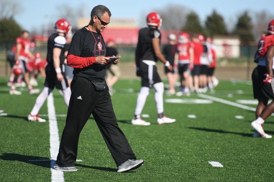 USD head coach Bob Nielson during spring football camp Monday, April, 8, on the outdoor practice field at the university in Vermillion.