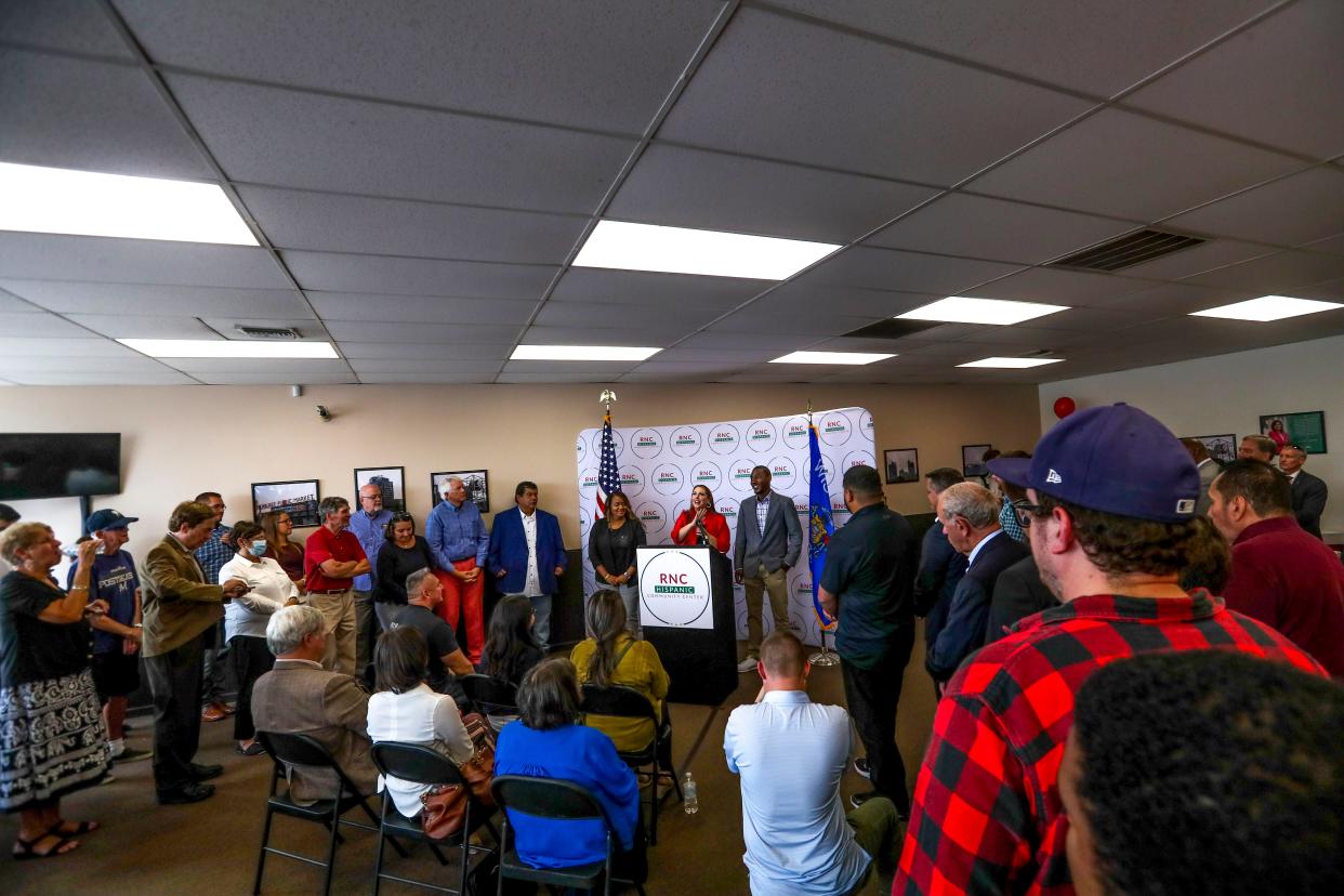 RNC Chairwoman Ronna McDaniel, middle, awards Dawn Marie Perez Maldonado and Frankie Russell Jr. the Chairman's Champion certificate toward the end of presiding over the opening of the RNC Hispanic Community Center located at 1310 W. Lincoln Ave., Milwaukee in September 2021.