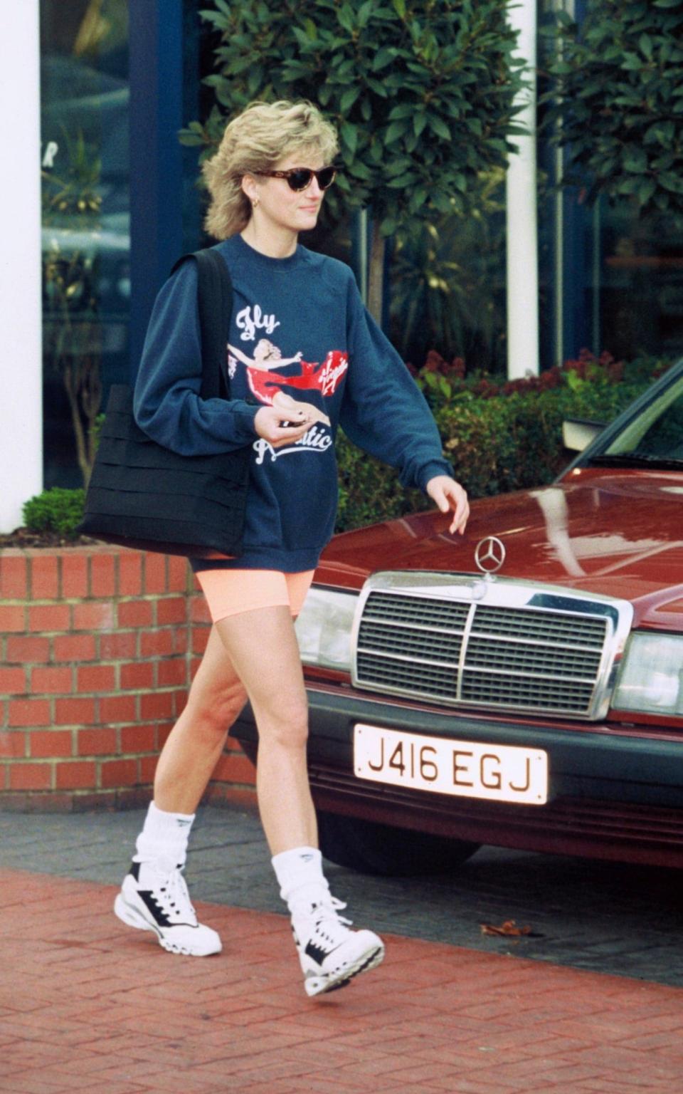 Diana wears her famous Virgin Atlantic sweatshirt in November 1995 - Getty