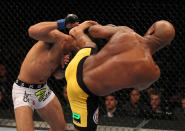 RIO DE JANEIRO, BRAZIL - AUGUST 27: (R-L) Anderson Silva kicks Yushin Okami during the UFC Middleweight Championship bout at UFC 134 at HSBC Arena on August 27, 2011 in Rio de Janeiro, Brazil. (Photo by Al Bello/Zuffa LLC/[Zuffa LLC via Getty Images)