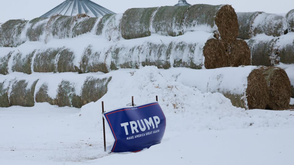 A campaign sign supporting former President Donald Trump is seen stuck in the ground on January 10, 2024, in Des Moines, Iowa. - Joe Raedle/Getty Images
