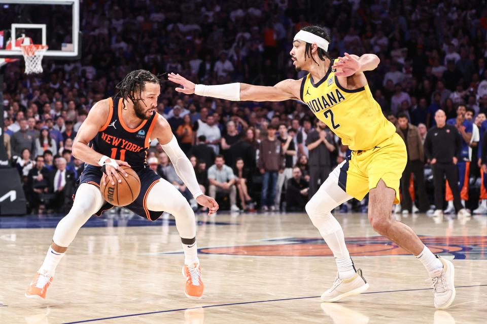 New York Knicks guard Jalen Brunson (11) looks to drive past Indiana Pacers guard Andrew Nembhard (2) in the fourth quarter during game two of the second round for the 2024 NBA playoffs at Madison Square Garden.