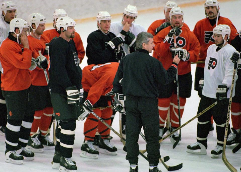 Philadelphia Flyers' Coach Terry Murray directs the team during practice Thursday, May 29, 1997, in Voorhees, N.J. two days ahead of the Stanley Cup Finals series vs. the Detroit Red Wings.