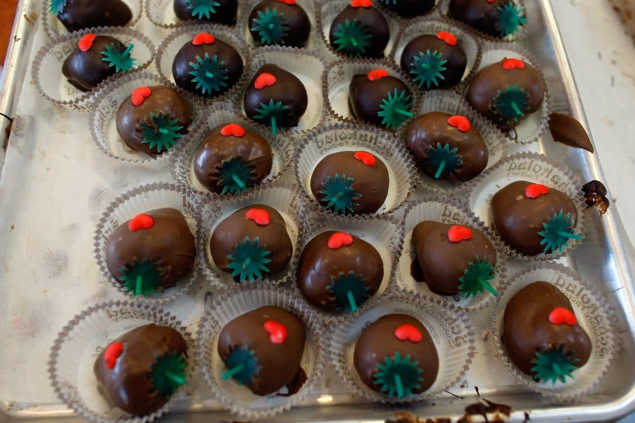 DAVIE, FL – FEBRUARY 13: Chocolate-dipped strawberries are ready to be consumed at Schakolad Chocolate Factory on February 13, 2009 in Davie, Florida. Chocolate, flowers, and cards usually fly off the shelves for Valentine’s Day, but with the economic turmoil causing people to tighten up their spending, merchants are hoping for a good turnout this year. (Photo by Joe Raedle/Getty Images)