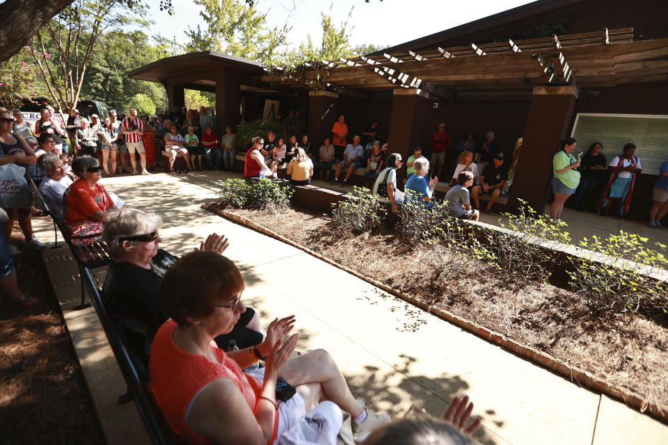 Elvis fans from Denmark and the Northeast Mississippi area gather for for Elvis Fan Appreciation Day at Elvis Presley's birthplace on Saturday morning, Aug. 13, 2022, in Tupelo, Miss. (Adam Robison/The Northeast Mississippi Daily Journal via AP)