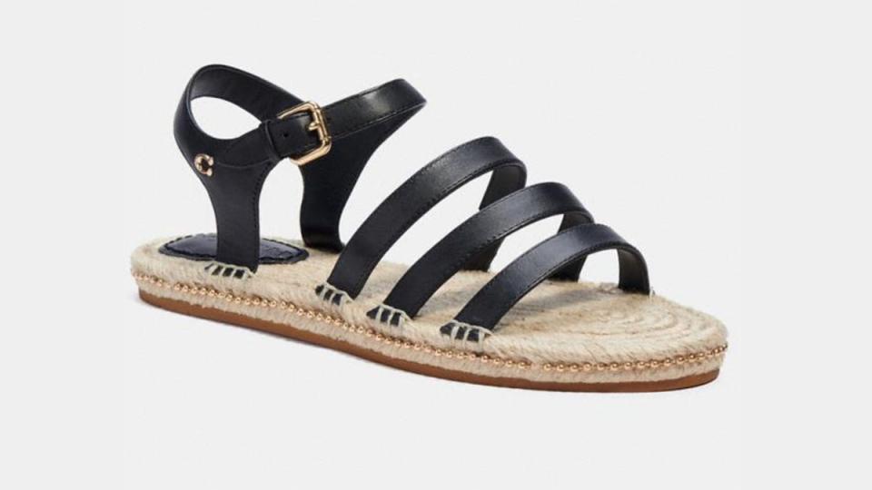 Summer-ready kicks like flats and sandals are on sale at Coach Outlet.