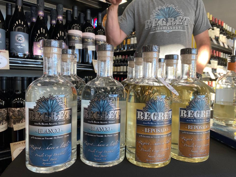 Owner and distiller Rob Lombardi said his Regret brand Tequila-style distilled spirit is made from only two ingredients: spring water and agave nectar. He is seen here at a tasting at Liquor World in South Easton on Thursday, March 8, 2024.