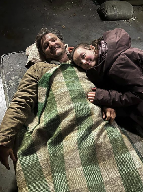 Behind-the-scenes photo of Pedro Pascal and Bella Ramsey from "The Last of Us"