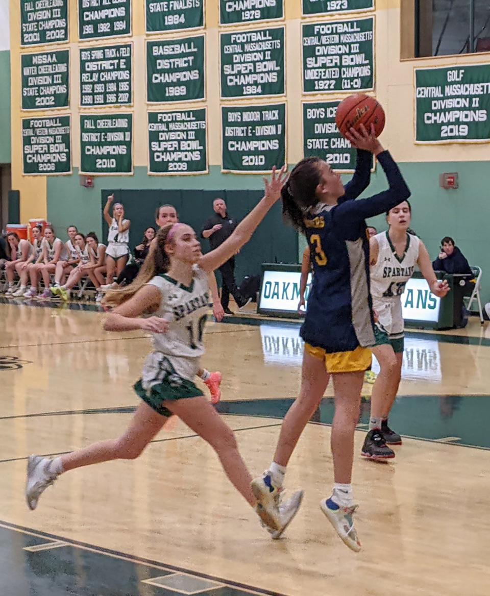 Quabbin's Meaghan Doyle (3) puts up a shot in front of Oakmont's Molly Horgan (10) during a game in Ashburnham.