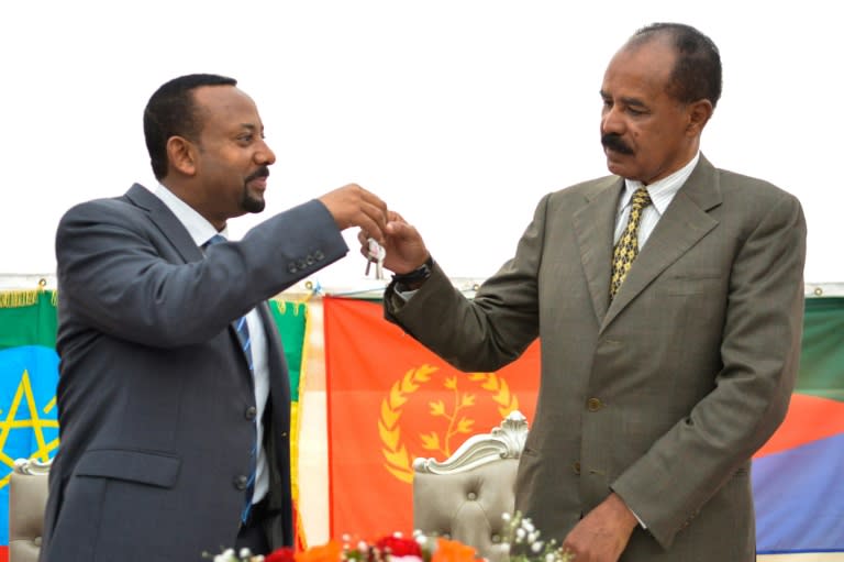 Ethiopian Prime Minister Abiy Ahmed (L) and President Isaias Afwerki of Eritrea celebrated the reopening of Asmara's embassy in Addis Ababa on Monday