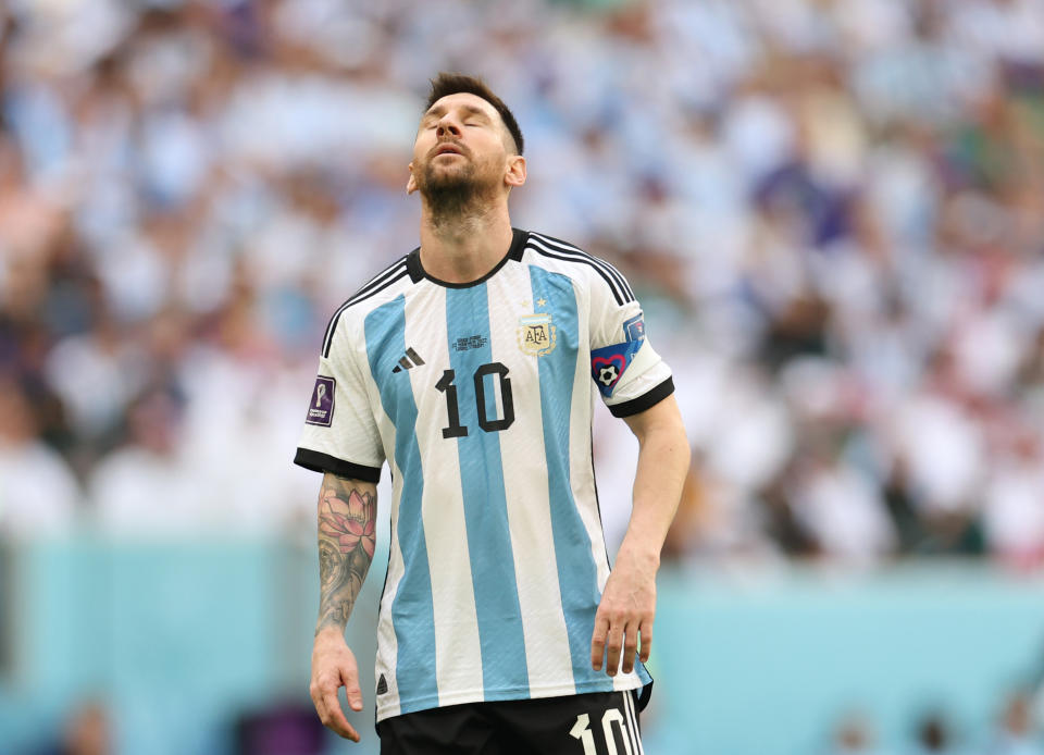 LUSAIL CITY, QATAR - NOVEMBER 22: Lionel Messi of Argentina  reacts during the FIFA World Cup Qatar 2022 Group C match between Argentina and Saudi Arabia at Lusail Stadium on November 22, 2022 in Lusail City, Qatar. (Photo by Catherine Ivill/Getty Images)