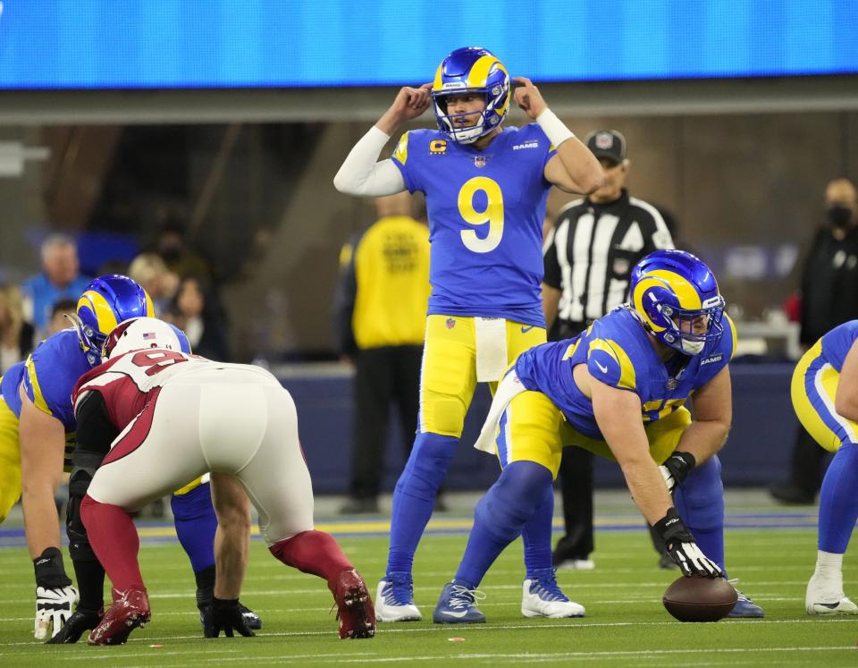 Jan 17, 2022; Los Angeles, California, USA;  Los Angeles Rams quarterback Matthew Stafford (9) calls a play against the Arizona Cardinals during the first quarter of the NFC Wild Card playoff game.