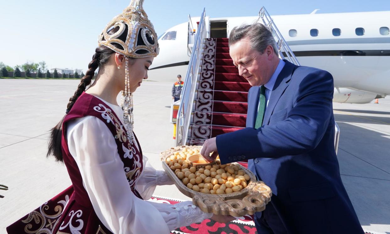 <span>David Cameron arrives at Bishek airport in Kyrgyzstan in an Embraer Lineage 1000 luxury charter plane during his central Asian tour.</span><span>Photograph: Getty Images</span>