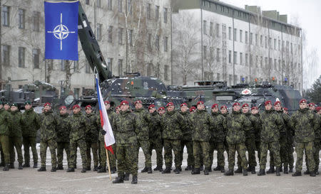 Netherlands' soldiers attend a ceremony to welcome the German battalion being deployed to Lithuania as part of NATO deterrence measures against Russia in Rukla, Lithuania February 7, 2017. REUTERS/Ints Kalnins