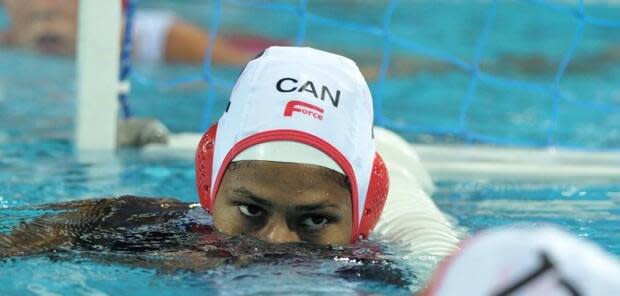 Krystina Alogbo was a key member of the women's national water polo team for 15 years, and captain of the team when it qualified in 2019 for its first Olympics since 2004. (Courtesy Water Polo Canada - image credit)