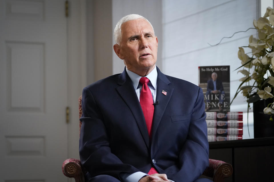 Former Vice President Mike Pence sits for an interview with the Associated Press, Wednesday, Nov. 16, 2022, in New York. (AP Photo/John Minchillo)