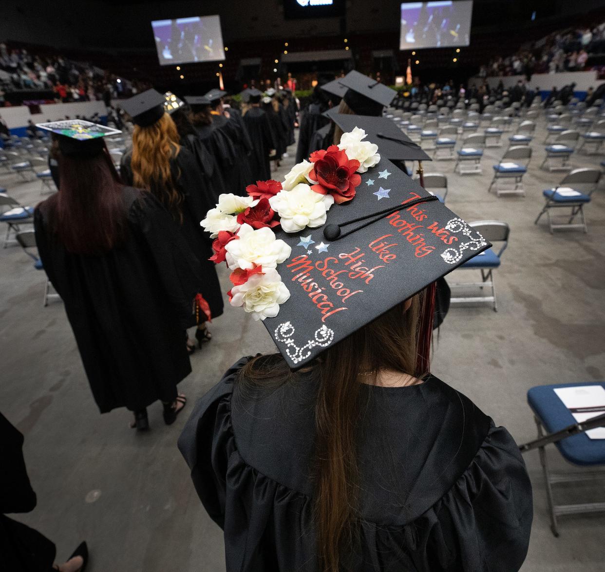 Polk State College graduates process into the graduation ceremonies at the RP Funding Center in Lakeland in 2021.