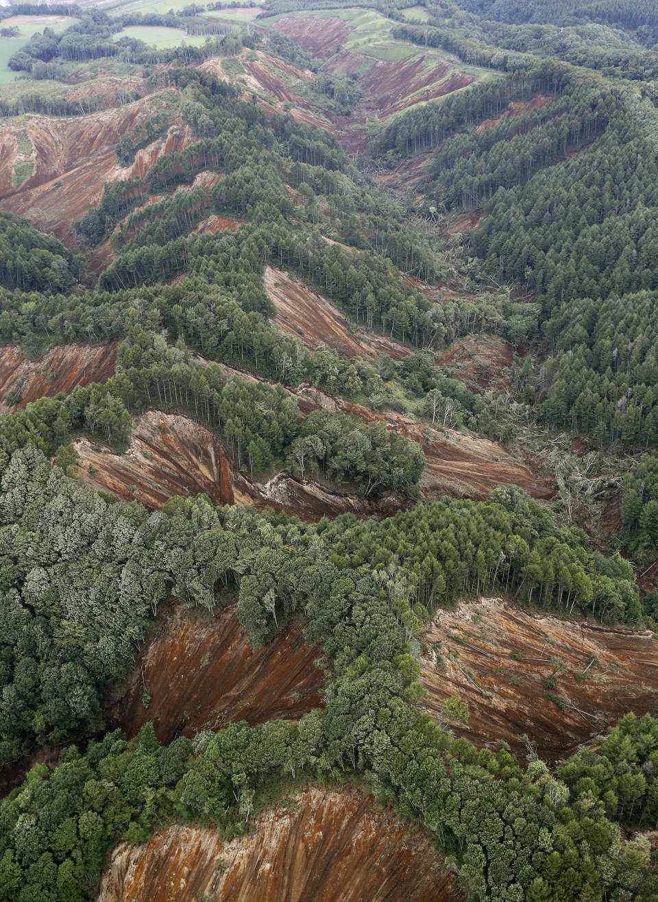 <p>This aerial photo shows thee site of landslides after an earthquake in Atsuma town, Hokkaido, northern Japan, Thursday, Sept. 6, 2018. (Photo: Kyodo News via AP) </p>