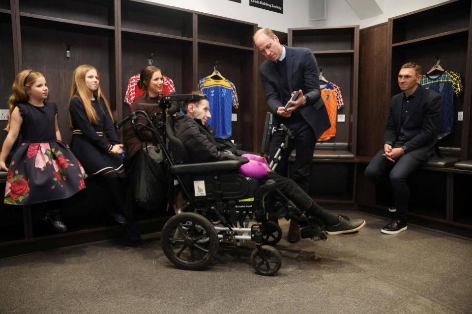 Bradford Telegraph and Argus: The Prince of Wales (second right) meets Kevin Sinfield (right) and Rob Burrow as his wife Lindsey Burrow and children Maya (left) and Macy look on, during a visit to Headingley Stadium, Leeds, to congratulate them on their efforts to raise awareness of