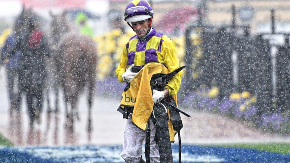 Jockey Noel Callow is seen after Race 1. (Photo by Vince Caligiuri/Getty Images)