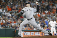 New York Yankees starting pitcher Jordan Montgomery delivers to Houston Astros' Jose Altuve during the first inning in the first game of a baseball doubleheader Thursday, July 21, 2022, in Houston. (AP Photo/Kevin M. Cox)
