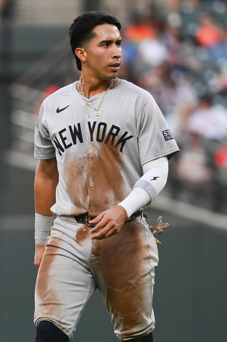 May 1, 2024; Baltimore, Maryland, USA; New York Yankees third baseman Oswaldo Cabrera (95) walks across the field after the third inning against the Baltimore Orioles at Oriole Park at Camden Yards. Mandatory Credit: Tommy Gilligan-USA TODAY Sports