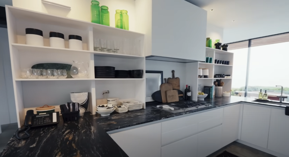 black countertop in smaller kitchen