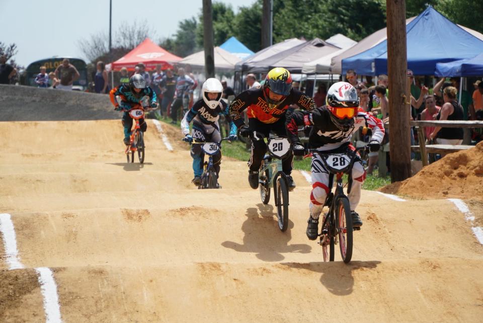 BMX riders compete in a previous race at the BMX track in Fairgrounds Park.