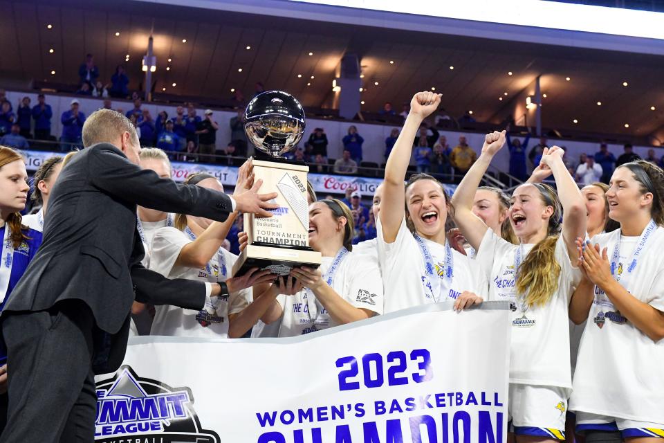 South Dakota State celebrates winning the Summit League women’s championship on Tuesday, March 7, 2023, at the Denny Sanford Premier Center in Sioux Falls.