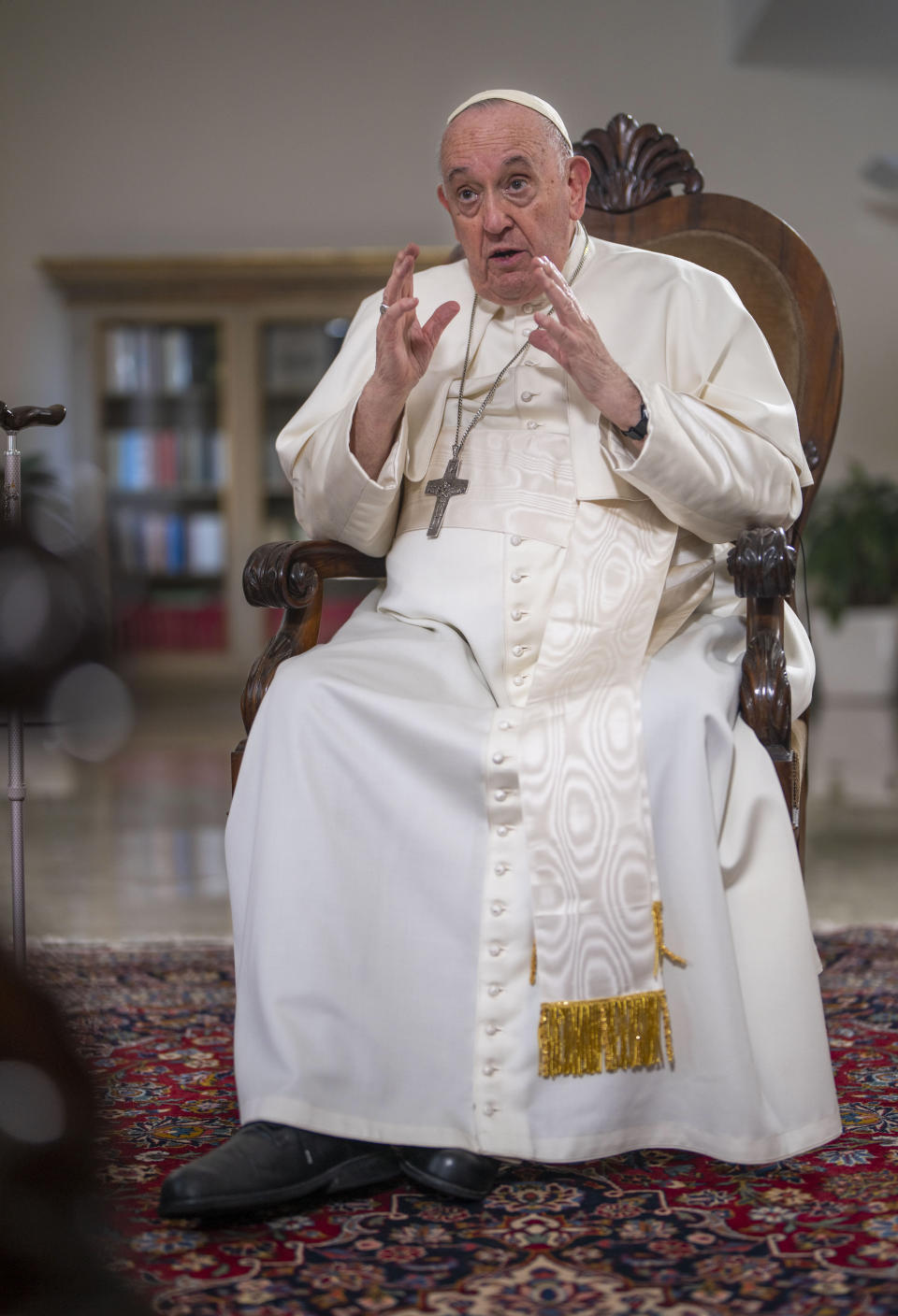 Pope Francis speaks during an interview with The Associated Press at the Vatican, Tuesday, Jan. 24, 2023. Francis acknowledged that Catholic bishops in some parts of the world support laws that criminalize homosexuality or discriminate against the LGBTQ community, and he himself referred to homosexuality in terms of "sin." But he attributed attitudes to culture backgrounds, and said bishops in particular need to undergo a process of change to recognize the dignity of everyone. (AP Photo/Domenico Stinellis)