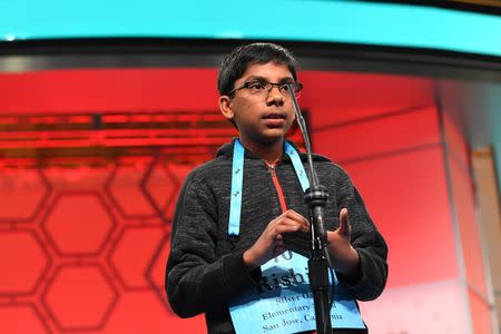 May 31, 2018; National Harbor, MD, USA; Rishik Gandhasri from California spelled the word corbel correctly during the 2018 Scripps National Spelling Bee at the Gaylord National Resort and Convention Center. Mandatory Credit: Jack Gruber-USA TODAY NETWORK