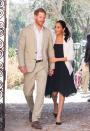 <p>Harry and Meghan walked through the Andalusian Gardens in Rabat holding hands, with Meghan also holding onto her husband's arm. </p>