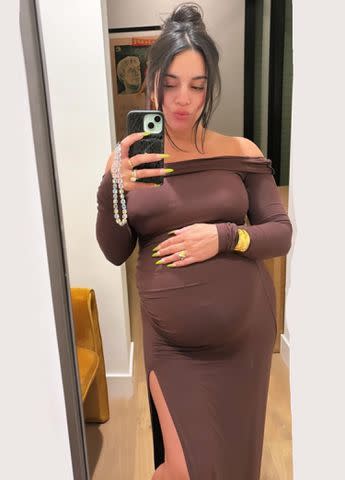 <p>Vanessa Hudgens/Instagram</p> Pregnant Vanessa Hudgens cradles her baby bump